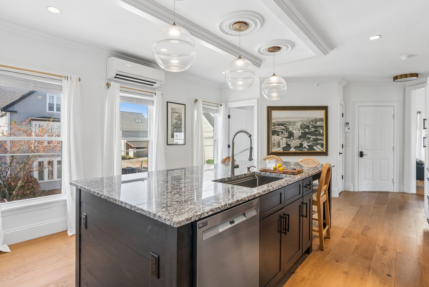 Granite kitchen island with sink and dishwasher, Residence One