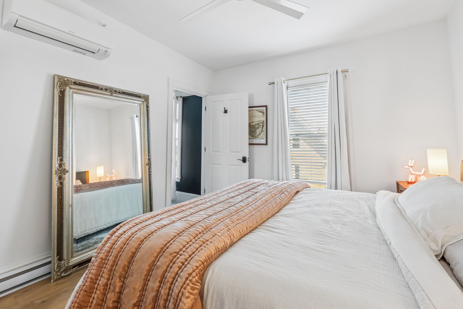 Bedroom with full-length mirror, Residence One