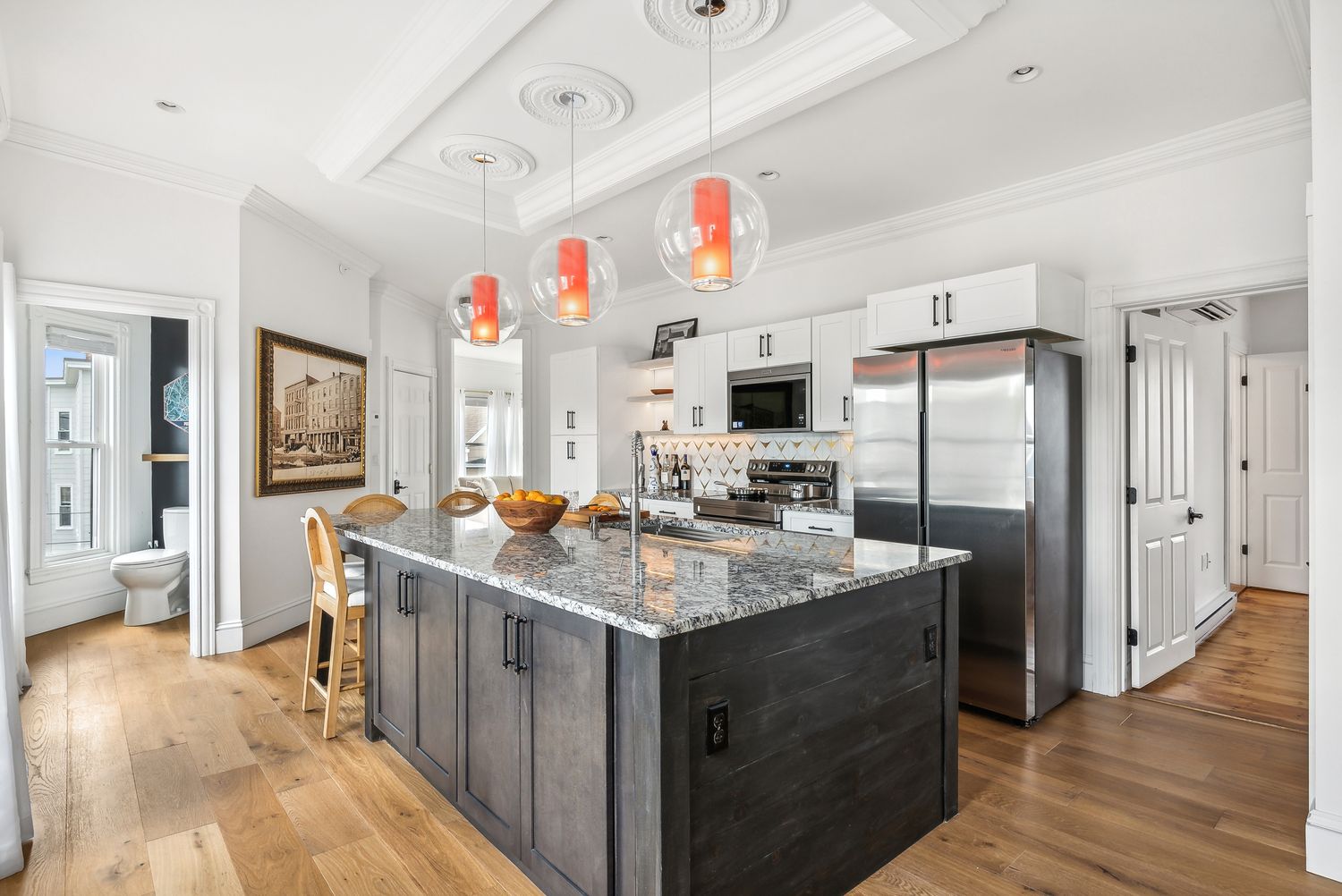 Kitchen island looking toward the entry, Residence Three