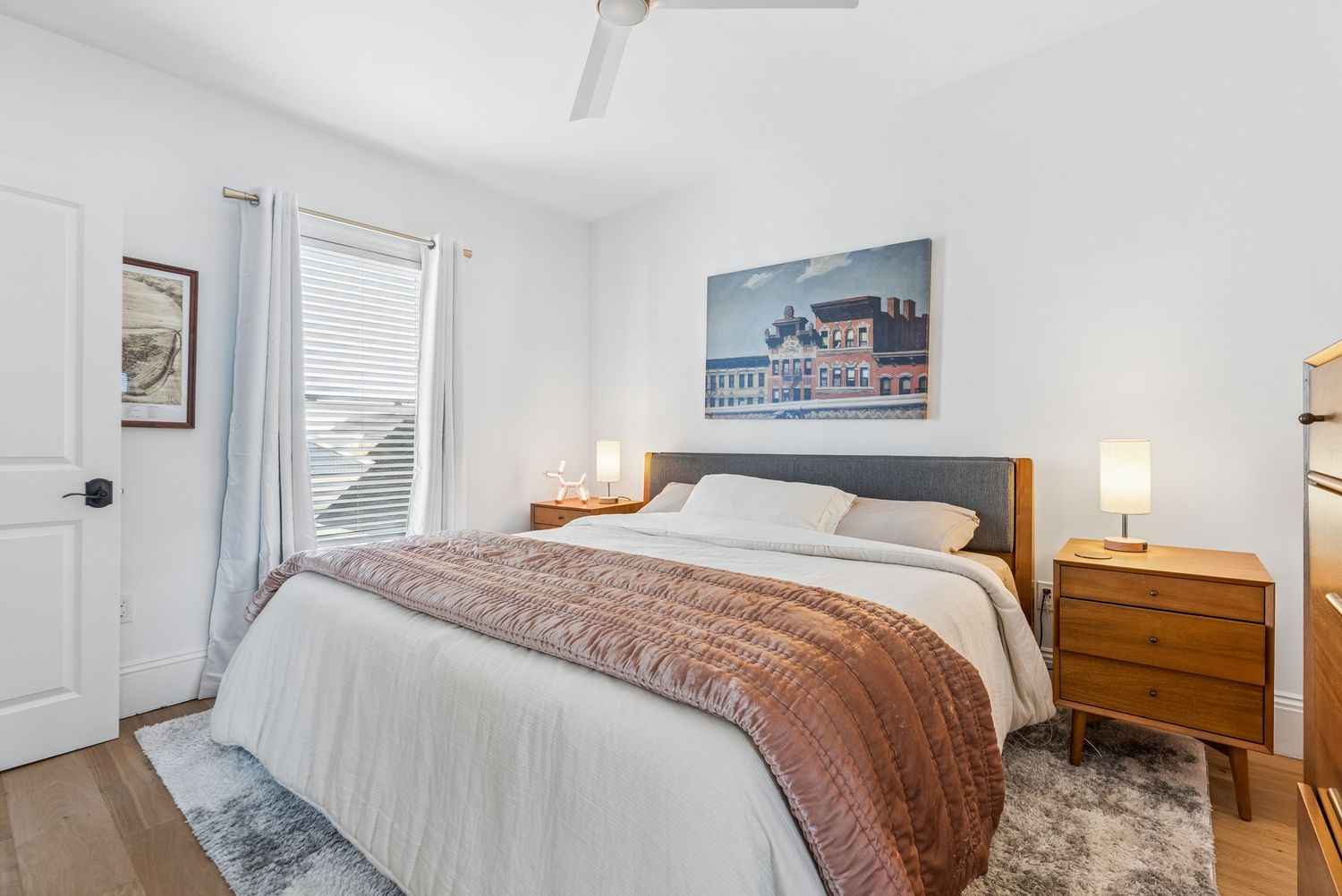 Bedroom with queen bed and paired nightstands, Residence Three